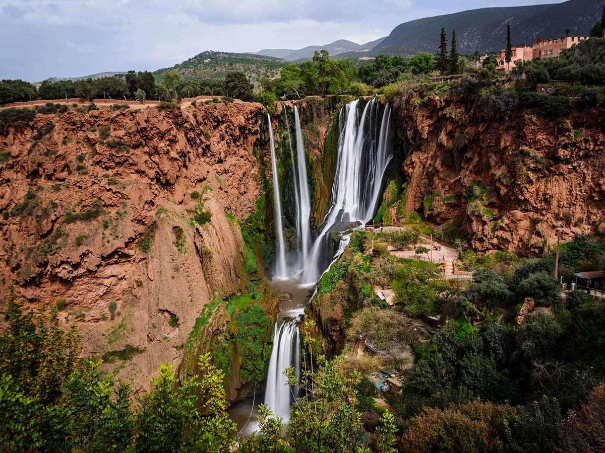 Ouzoud Waterfalls glowing in golden sunset light